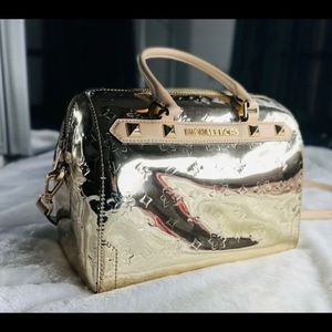 Michael Kora gold metallic duffle purse